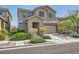Charming two-story home featuring desert landscaping, covered entry, and attached two-car garage at 7900 Eastern Elk St, Las Vegas, NV 89149