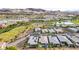 An aerial view showcases the community's golf course and mountain views at 8 Reflection Cove Dr, Henderson, NV 89011