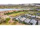 Community aerial showcases the neighborhood's green spaces, lakes and golf course at 8 Reflection Cove Dr, Henderson, NV 89011