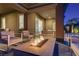Cozy backyard patio with a fire pit and comfortable seating, perfect for entertaining at 8 Reflection Cove Dr, Henderson, NV 89011
