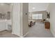 Hallway view leading to the bright bedroom and bathroom at 8 Reflection Cove Dr, Henderson, NV 89011