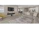 Spacious living room featuring an entertainment center and an open floorplan layout at 8 Reflection Cove Dr, Henderson, NV 89011
