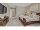 Comfortable main bedroom with a large bed, decorative furnishings, and a mounted television at 8 Reflection Cove Dr, Henderson, NV 89011