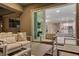 Open patio with comfortable seating area, seamless transition to the indoor living space at 8 Reflection Cove Dr, Henderson, NV 89011