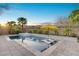 Inviting pool and spa area with lush landscaping and lounge chairs for relaxation at 8 Reflection Cove Dr, Henderson, NV 89011