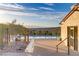 Inviting pool area with mountain views, complemented by nearby community building at 8 Reflection Cove Dr, Henderson, NV 89011