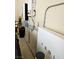 Tesla Powerwall in the garage along with related hardware and electrical wiring at 8088 Smoking Jacket Pl, Las Vegas, NV 89166