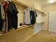 Spacious walk-in closet with ample hanging space and built-in shelving, perfect for organizing clothes and accessories at 8088 Smoking Jacket Pl, Las Vegas, NV 89166