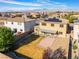 Expansive backyard featuring a covered patio, low-maintenance landscaping, and a brick-paved area for outdoor enjoyment at 8112 Sapphire Sea St, North Las Vegas, NV 89085