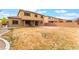Spacious backyard with a covered patio, brick area, and plenty of space for recreation and gardening at 8112 Sapphire Sea St, North Las Vegas, NV 89085
