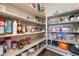 Spacious walk-in pantry with ample shelving for food storage and organization at 8112 Sapphire Sea St, North Las Vegas, NV 89085