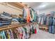 Well-organized walk-in closet with shelves and hanging rods, offering ample storage space at 8112 Sapphire Sea St, North Las Vegas, NV 89085