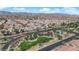 Bird's-eye view of the community pool, lush landscaping, ample sidewalks, and a well-manicured community space at 8658 Tom Noon Ave # 103, Las Vegas, NV 89178