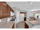 Bright kitchen with wood cabinets, stainless steel appliances, and an open layout at 8658 Tom Noon Ave # 103, Las Vegas, NV 89178