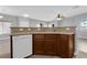 Kitchen featuring an breakfast bar and views of the adjacent living space at 8658 Tom Noon Ave # 103, Las Vegas, NV 89178