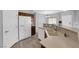 Well-equipped kitchen with a refrigerator, stainless steel sink, and ample countertop space at 8658 Tom Noon Ave # 103, Las Vegas, NV 89178