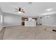 Expansive living area with ceiling fan, recessed lighting, and easy access to the kitchen at 8658 Tom Noon Ave # 103, Las Vegas, NV 89178