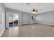 Spacious living area leading to a private yard and well lit by natural light at 8658 Tom Noon Ave # 103, Las Vegas, NV 89178
