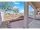 The patio features a brick border, gravel accents, and privacy fences at 8658 Tom Noon Ave # 103, Las Vegas, NV 89178