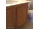 Bathroom with tile flooring, vanity, cabinet, and white toilet at 8970 Flying Frog Ave, Las Vegas, NV 89148