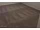 Close-up view of a plush carpet with visible vacuum lines, showcasing the flooring's clean appearance at 8970 Flying Frog Ave, Las Vegas, NV 89148