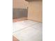Outdoor patio with concrete slabs and a block wall, providing a private and simple outdoor area at 8970 Flying Frog Ave, Las Vegas, NV 89148