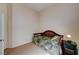 Simple bedroom featuring a daybed and a small side table with a lamp at 8985 S Durango Dr # 2014, Las Vegas, NV 89113