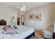 Neutral bedroom with a fan and multiple closets at 8985 S Durango Dr # 2014, Las Vegas, NV 89113