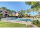 Community pool with lounge chairs and landscaping at 8985 S Durango Dr # 2014, Las Vegas, NV 89113