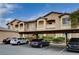 Exterior angle of a multi-unit building offering covered parking and convenient access at 8985 S Durango Dr # 2014, Las Vegas, NV 89113