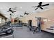 Well-equipped fitness center with cardio machines, weights, and ceiling fans at 8985 S Durango Dr # 2014, Las Vegas, NV 89113