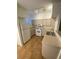 Functional kitchen features white appliances and ample cabinet space, ready for culinary creations at 9050 W Warm Springs Rd # 1123, Las Vegas, NV 89148