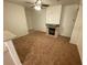 Cozy living room with a fireplace and an arched alcove at 9050 W Warm Springs Rd # 1123, Las Vegas, NV 89148