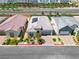 Aerial shot of single-Gathering home with solar panels, modern exterior, and pristine landscaping at 9057 N Skye Treeline St, Las Vegas, NV 89166