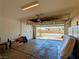 A spacious two car garage offers ample storage and convenient access to the home at 9057 N Skye Treeline St, Las Vegas, NV 89166