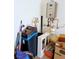 Garage features a modern tankless water heater for on demand hot water at 9057 N Skye Treeline St, Las Vegas, NV 89166