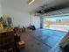 A well-lit two-car garage has ample space for parking and storage at 9057 N Skye Treeline St, Las Vegas, NV 89166