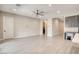 Open-concept living space featuring neutral paint, recessed lighting, and a ceiling fan at 9057 N Skye Treeline St, Las Vegas, NV 89166