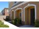 Charming front entrances to residential townhomes, and landscaped bushes at 9303 Gilcrease Ave # 1097, Las Vegas, NV 89149