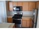 Bright kitchen featuring stainless steel appliances, light wood cabinets and laminate countertops at 9303 Gilcrease Ave # 1097, Las Vegas, NV 89149
