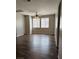 Bright living room showcases an airy layout and modern flooring at 9303 Gilcrease Ave # 1097, Las Vegas, NV 89149