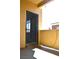 A view of the patio featuring stucco walls and a screen door at 9303 Gilcrease Ave # 1097, Las Vegas, NV 89149