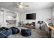 Spacious bonus room with a desk, carpet, and foosball table; great for play at 9768 Fox Estate St, Las Vegas, NV 89141