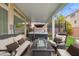 This covered patio has comfortable seating, a jacuzzi, and plenty of shade at 9768 Fox Estate St, Las Vegas, NV 89141