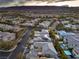 Detailed overhead shot of a luxury home with a tiled roof, pool, and landscaped backyard at 10 Sugarberry Ln, Las Vegas, NV 89135