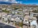 Aerial view of multiple luxury homes with beautiful mountain backdrop, offering a serene and upscale living experience at 10 Sugarberry Ln, Las Vegas, NV 89135