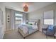 Cozy bedroom with natural light, neutral tones, and comfortable furnishings at 10 Sugarberry Ln, Las Vegas, NV 89135