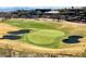 Beautiful green on the golf course with sand traps at 10 Sugarberry Ln, Las Vegas, NV 89135