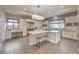 Modern kitchen features stylish backsplash, stainless appliances, ample counter space and breakfast bar at 10 Sugarberry Ln, Las Vegas, NV 89135