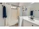 Bathroom featuring shower-tub combo, and modern vanity at 1010 Christopher View Ave, North Las Vegas, NV 89032